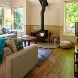 Alpine Valley Cottage two lounge with woodfire