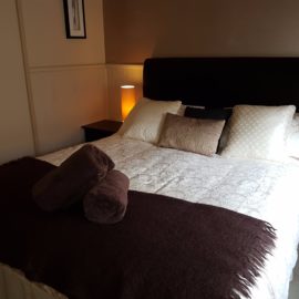 Sink into the queen size bed