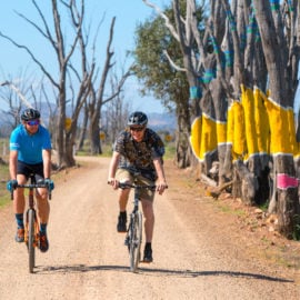 Cyclists riding on the gravel roads in Winton Wetlands