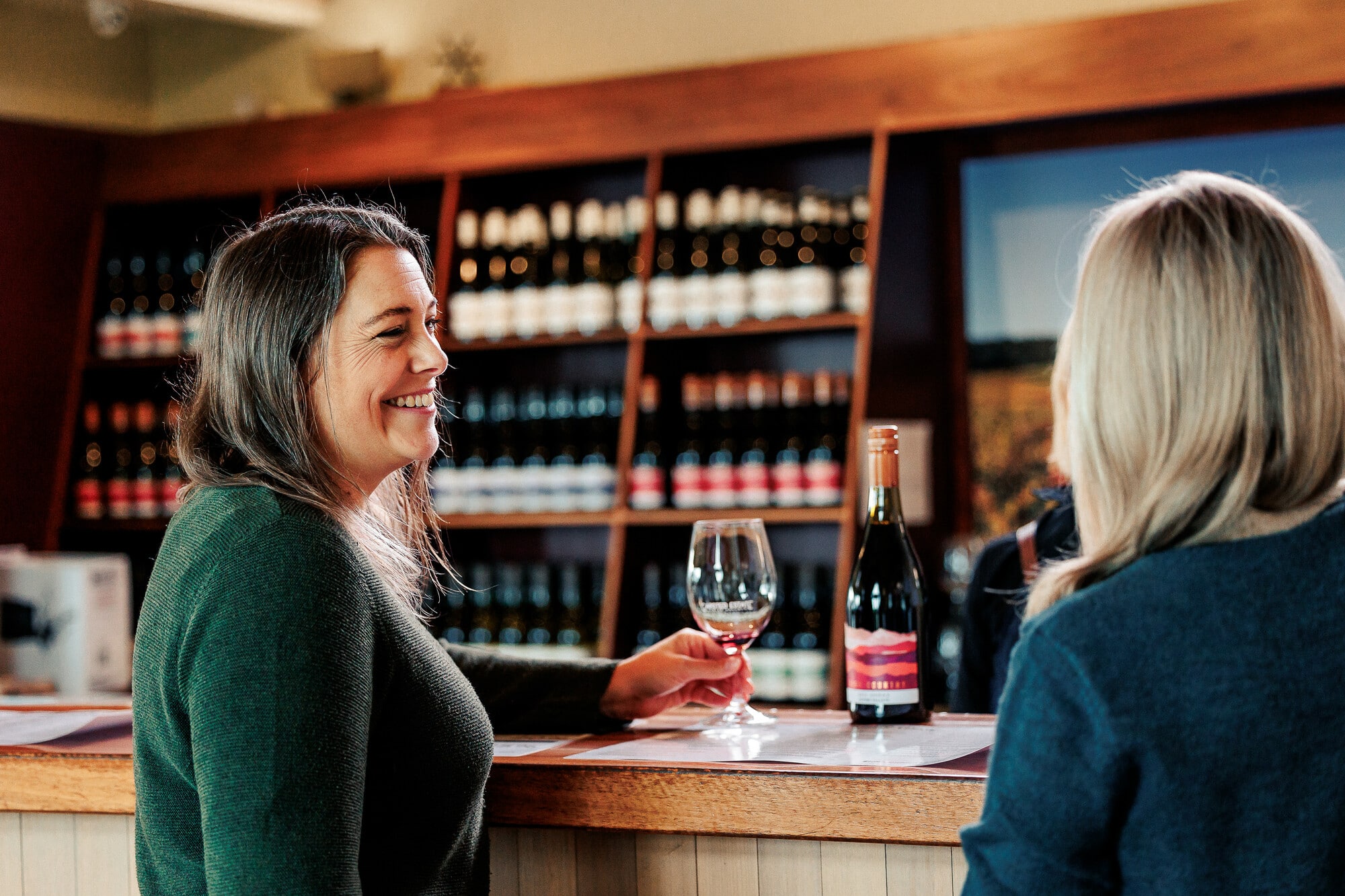 Two people enjoying a wine tasting at Gapsted Estate