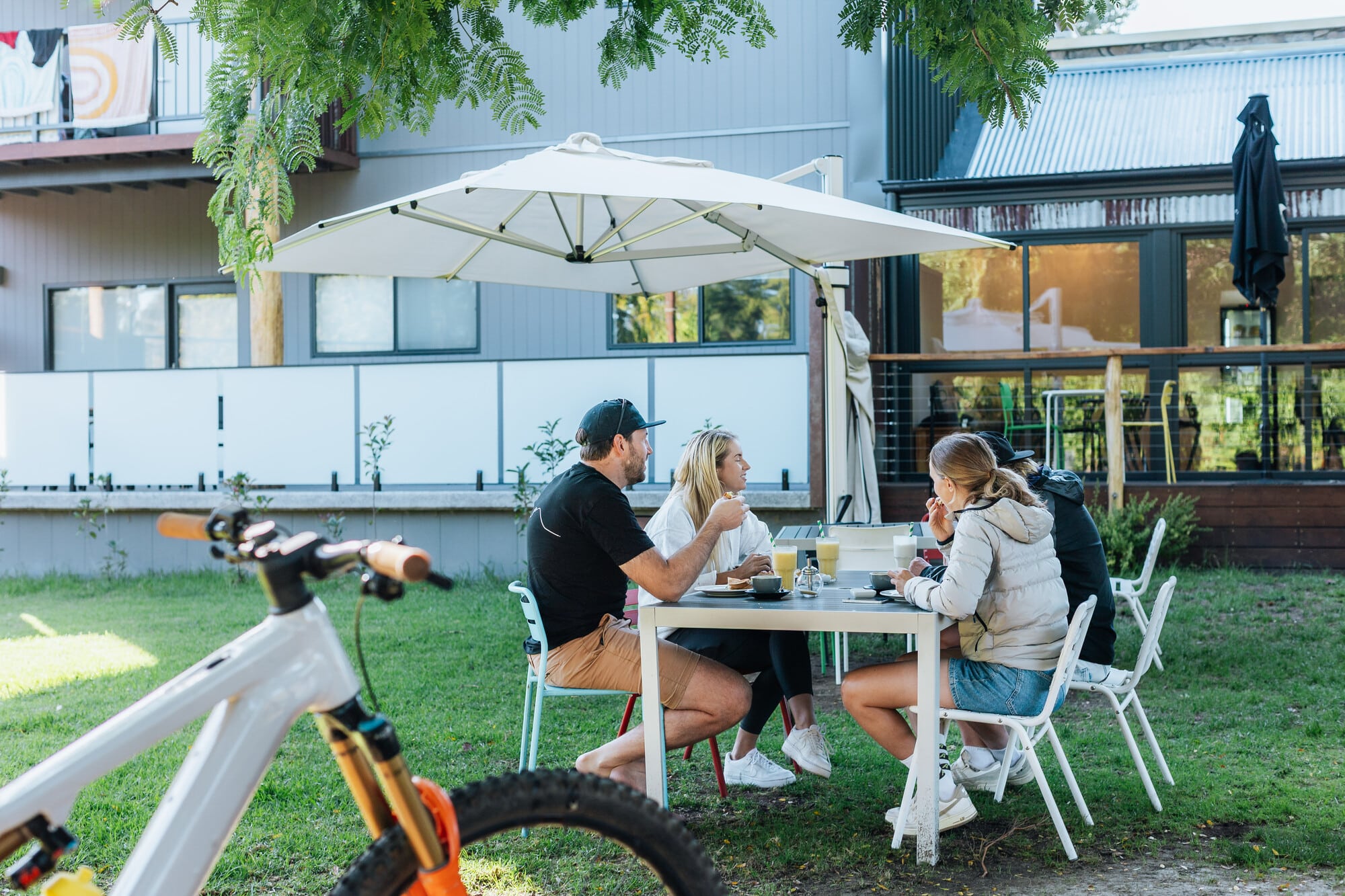 Group of mountain bikers enjoying breakfast at Rocky valley Bikes and Snow Sports