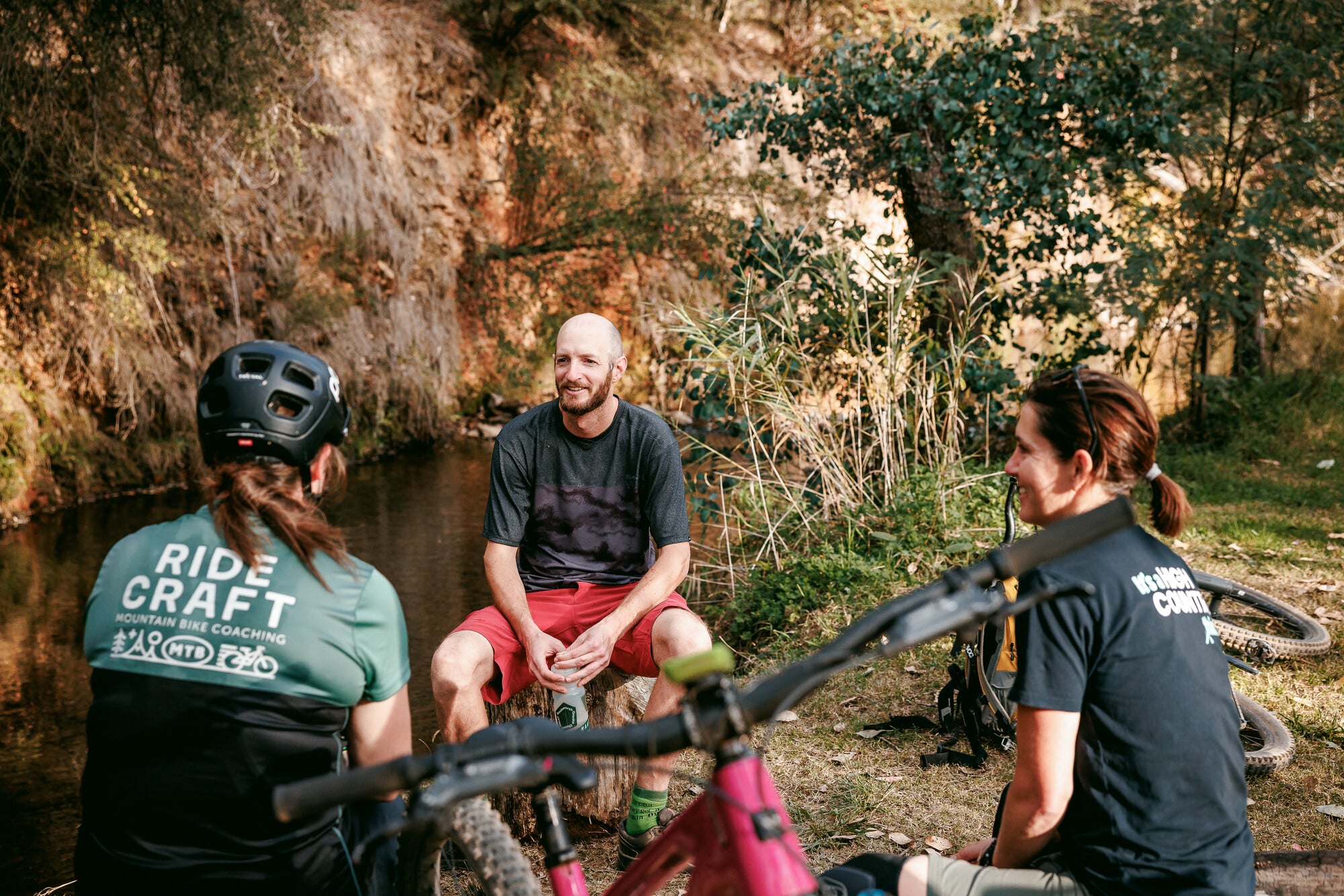 Group cycling at Mystic Bike Park on mountain bikes on a RideCraft guided ride