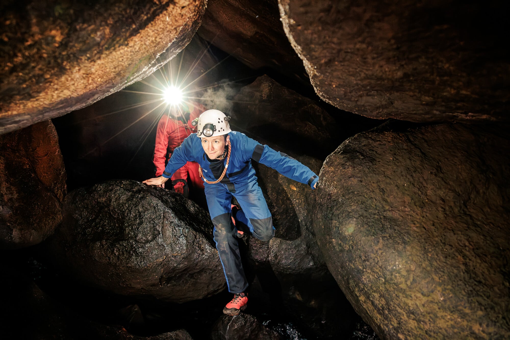 People caving on Mount Buffalo's underground river with Adventure Guides Australia
