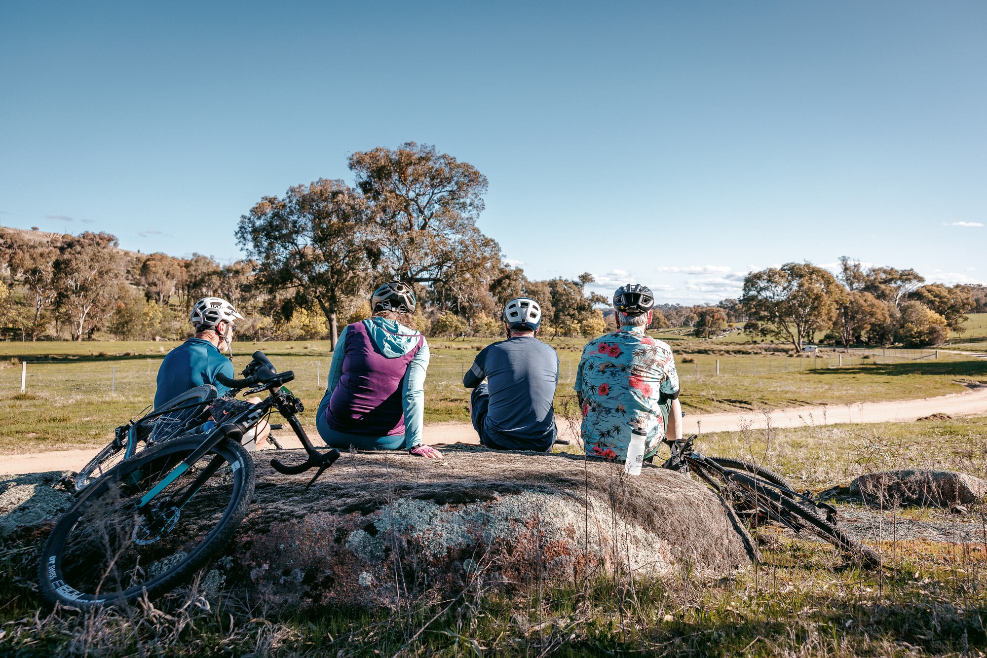 Group of cyclists enjoying a stop on the Wangaratta - Eldorado Loop.