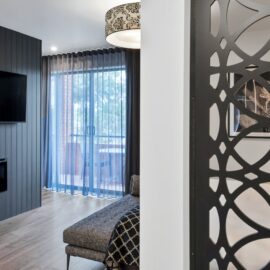 Modern apartment with fireplace and television