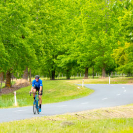 Paul van der Ploeg riding along Stanley road